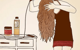 A woman in a red dress is drying her long hair with a blow dryer. beside her is a dresser with hair care products like shampoo and henna. the scene has a creamy beige background.