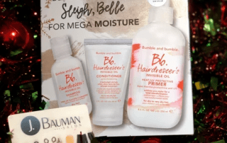 Holiday-themed promotional image for bumble and bumble hair care products, featuring conditioner, primer, and a gift card, set against a sparkly red and green background.