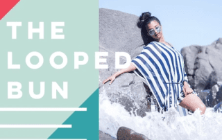 A woman with a looped bun hairstyle sits on beach rocks, waves splashing around her. text on the left reads "the looped bun" in a graphic with teal and red blocks.