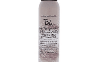 A can of bumble and bumble pret-a-powder tres invisible nourishing dry shampoo, featuring uv protective, 2-in-1 style extender in a speckled white and gray design.